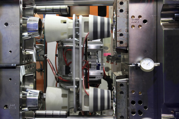 how clamp tonnage affects your injection molding process