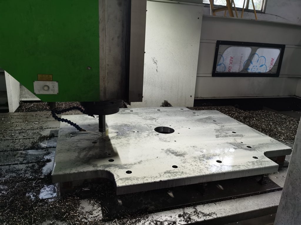 Machining of mold clamp magnetic platen, solid steel block construction. 